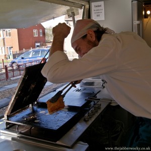 Barny toasting in the van under one arm